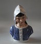 Dahl Jensen 
1365 "Tine" 
Girl  bust 
(DJ)19 cm 
Marked with the 
Royal Crown and 
DJ Copenhagen. 
In ...