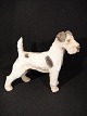 Figurines
 Terrier.
 B & G No: 
1998
 Bing & 
Grondahl.
 artist Dahl 
Jensen.
 Height: 14 cm 
...