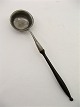 A 19th century 
Pewter punch 
spoon L. 39 cm.