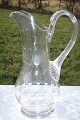 Glass Pitcher 
on foot. Height 
26cm. Age 
circa. 1910. 
Fine condition.