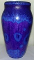 Large Royal 
Copenhagen 
Crystalline 
glaze vase by 
Carl Frederik 
Ludvigsen No 7. 
Measures 34cm 
and ...