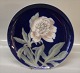 Royal 
Copenhagen 
1482-1125 Plate 
25.5 cm Flower 
on deep blue 
background In 
mint and nice 
condition
