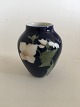 Bing & Grøndahl 
Art Nouveau 
Vase with 
Butterfly No 
1676/12. 
Measures 9cm 
and is in good 
condition.