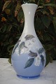 Vase with 
flower 
decoration. 
Royal 
Copenhagen 
porcelain, Vase 
no. 853-51. 
Height  21.5 
cms. 1. ...