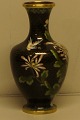 Cloisonne vase 
enamelled 
metal. I have 2 
vases. 19 cm. 
high. In good 
condition, 
dent.