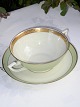 Royal 
Copenhagen 
porcelain. 
Dagmar 
tableware, 
green with 
gold. Royal 
Copenhagen 
Dagmar soup cup 
...