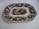 1 brown stamped 
earthenware 
tray, England 
ca. 1880.
37cm. wide and 
46cm. long.