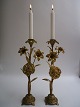 1 pair nap of 
gilded 
candlesticks 
with floral 
decorations, 
France approx. 
1880. 21 cm. 
high.