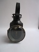 Black painted 
trains lamp 
with worn gold 
edge, original 
"petrolemusbrænder" 
with red / 
green / ...