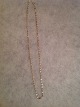 Necklace. 
Silver 830 s 
HJ (Jensen & 
Co.. Eftf - 
Aarhus 
1957-1970). 
Length: 42 cm. 
A width of ...