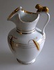 Lion pitcher, 
1880. White 
porcelain with 
gilding. H .: 
26 cm. Perfect 
condition.