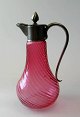 English ruby 
??colored jug 
with silvered 
top, handle and 
lid. o. 1880. 
Optical driven. 
Height .: ...