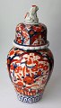 Imari lidded 
jar, 19th 
century. Japan. 
Dark blue 
underglaze with 
decorated with 
blue, red and 
...