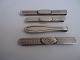 Tie pins in 
silver, Denmark 
approx. 1920.
275DKK per 
piece and 
375DKK for the 
Georg Jensen 
one.