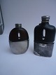 Flasks made of 
glass, leather 
and tin, 
England approx. 
1880.
Measurements 
are 
respectively; 
...