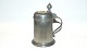 Pewter tankard 
1800 century 
with endless 
games 
Height 20 cm. 
Stamp in the 
lid