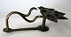 Indian bronze 
oil lamp, 19th 
century. 
Handles shaped 
like 
a&nbsp;cobra 
snake. 5 tulip 
shaped ...