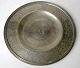 Chinese pewter 
dish, 19th 
century. On the 
tab numerous 
decorations in 
the form of 
shapes and ...