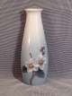 Vase with 
jasmine 
flowers. 
Height: 13.5 
cm. 
Bing & 
Grondahl B & G 
No. 8404-126 
price 125, - 
