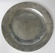 Tin plate, 
1744, Edward 
Toms, London. 
Stamped with 
master mark and 
Super Fine Hard 
metal. Dia .: 
...