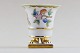 Herend, small 
center piece of 
porcelain. 
Decorated with 
flowers, lion 
feet in gold. 
In good ...