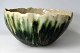 Porcelain bowl, 
20th century. 
Denmark. 
Grayish with 
glaze in black 
and green. With 
wave edge. H 
...