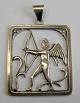 Pendant with 
cupid and 
arrow. Silver. 
Denmark. 
Stamped SM 830. 
Design: S.H. 
Mathiesen, 
Aalborg ...