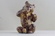 Royal 
Copenhagen 
figurine number 
21675, bear 
sitting. Height 
18cm. Produced 
by Knud Kyhn. 
In ...