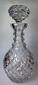Crystal 
decanter, 20th 
century. 
Decorated with 
waffle cuts. 
Stopper with 
cuttings. H .: 
27.5 cm.