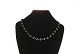 Elegant 
Necklace, 18 
Carat Gold
Stamp: 750
Length 40.5 
cm.
Width 0.7 cm. 
by stone
Thickness ...