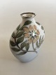 Bing & Grondahl 
Art Nouveau 
Unique vase by 
Emma Krogsbøll 
with silver 
inlay. 
Measaures 9cm 
and ...