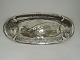 Kayser pewter. 
Fish dish. 
Length 60 cm. 
There is an 
inscription 
with the date 
of 1918. (See 
photo)