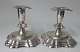 A pair of 
Danish silver 
candlesticks, 
1947. 
Rococoform. H 
.: 10.5 cm. 
Stamped: 894.