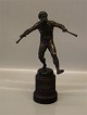 Pan  playing 
flutes - 
Dancing Faun in 
Bronze by 
Professor 
Peters on round 
wooden stand 21 
cm