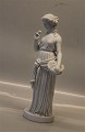 Bing and 
Grondahl 
Thorvaldsen 
Bisquit 
Flowergirl ca 
1830  30 cm 
SMall chip on a 
finger holding 
...