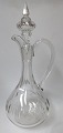 Derby decanter 
in glass, 20th 
century. 
Denmark. With 
olive grinding, 
stopper and 
handle. H .: 34 
cm.