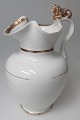 Bing &amp; 
Gr&oslash;ndal 
lion pitcher 
porcelain, 19th 
century. White 
porcelain with 
gildings. ...