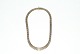 Brick course 
necklace with 7 
rows, 14 carat 
gold
Stamped: 585, 
SVG
Length 40 cm.
Width ...