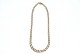Bismarck 
necklace, 8 
karat gold
Stamped: HMH, 
HMH
Length 43.5 
cm.
Width 6.1 - 
9.3 ...