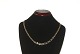 Necklace with 
Gold and White 
Gold 14 karat
Stamped: oray, 
14K
Length 40.5 
cm.
Width 0.4-0.75 
...