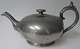 English tea pot 
in pewter, c. 
1920, England. 
Stamped: James 
Dixon &amp; 
Sons no. 
61,902th L .: 
...