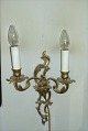 Brass sconce 
having two arms 

THIS PRODUCT 
IS IN OUR 
SECTION I 
HADSTEN. 
'Aladding 
Antique & ...