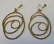 Pair of gilded 
ear rings, 
sterling, 20th 
century. 
Stamped: 
Sterling 925 p. 
H .: 5 cm.