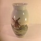 Vase with mill.
Bing & 
Grondahl.
B & G no. 
8682-420
First sorting.
Height: 19 ...