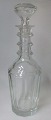 Large crystal 
decanter 20th 
century. 
Polished 10 
edged corpus 
with bolts on 
the neck. With 
glass ...