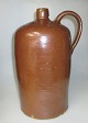 Antique liquor 
bottle, salt 
glazed 
stoneware, 19th 
century. 
Schleswig - 
Holstein. With 
handle. ...