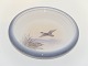 Royal 
Copenhagen, 
round tray with 
curved edge 
decorated with 
a flying duck. 
The factory 
mark ...