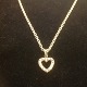 Heart pendant 
with 14 
brilliant-cut 
crystals.
Height: 2 cm. 
with the ax. 
Width: 1.5 cm.
silver ...