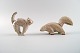 Höganäs, two 
pottery 
figurines, cat 
and skunk. 
Swedish design.
Measures: 
skunk 11.5 cm. 
x 6.5 ...