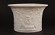 Bing & Grondahl 
wine cooler no. 
6112 of white 
biscuit
Decorated with 
Bacchus , 
cupids and 
putti ...